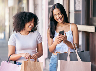 Women or friends shopping, smartphone and city street on website, mobile app or social media promotion, sale or discount for retail fashion. e commerce, fintech and customer people with shopping bag