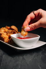 hand holding a plate with food