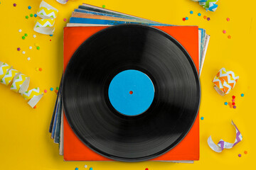Vinyl records, party music, top view. Empty copy space for record label mockup. Vintage retro sound recording style. Background for the design of a poster, postcard, and flyer for music events