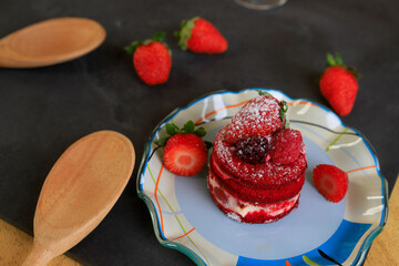 Tasty strawberry cake with whipped cream and with fresh strawberries. Pastry. Sweet tartlets dessert