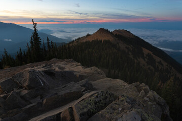 Sunset with fog over Puget Sound from mountain summit