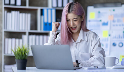 Business Asian woman work laptop computer at office, financial report, business plan investment, finance analysis concept.