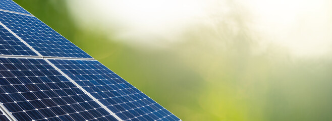 Solar panels on a green background 