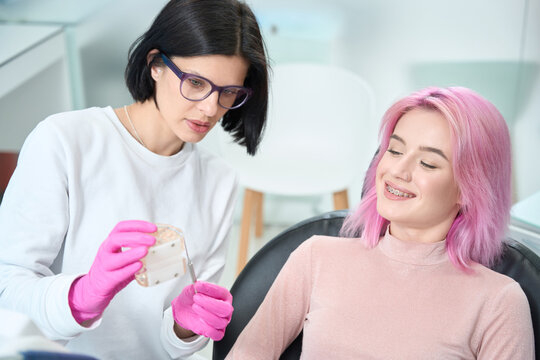 Two women communicate in the dental office