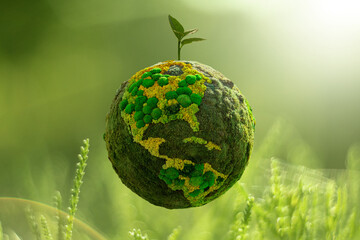 Green planet Earth from natural moss with plant. Symbol of sustainable development and renewable...
