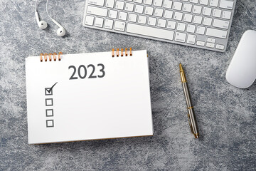 2023 goals for new year's resolutions plan, keyboard with mouse on desk, checklist concept. New...