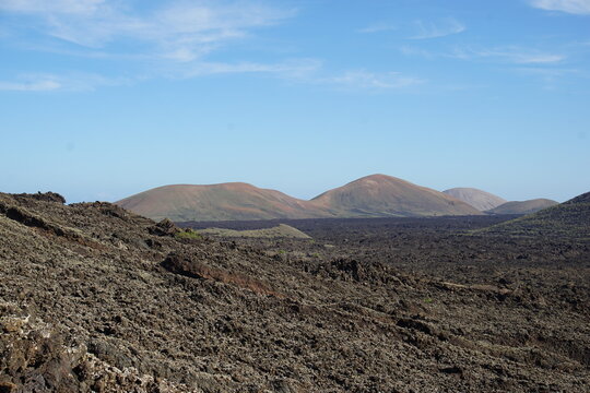 volcanic landscapes of lanzarote, photographed in november 2022. trekking day trip. Crater, volcano, sea of lava, solidified lava, landscape, sony a6000