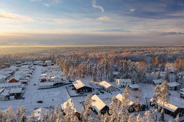 Suburban view from above with small houses and snow in Espoo, Finland