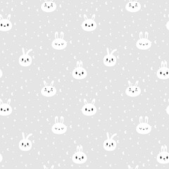 Fototapeta premium Seamless pattern with cute bunny. Hand drawn background with cartoon rabbits. Nursery style