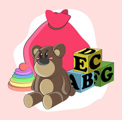 A toy bear sits near a bag of toys and cubes
