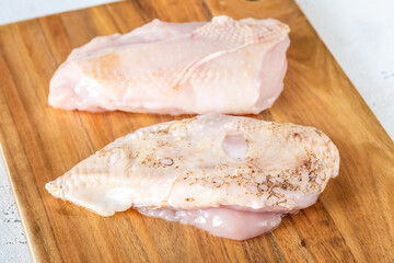 Uncooked chicken breast