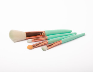 Cosmetic makeup brush isolated on white background. Blush, eyeshadow & contour, foundation, concealer & bronzer, angled brushes. Makeup set. Beauty concept.