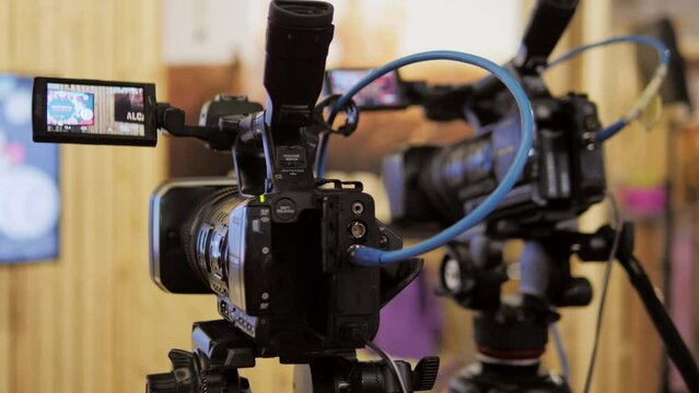 Behind the scenes backstage of studio video production or camera video shooting, broadcasting and online streaming. 