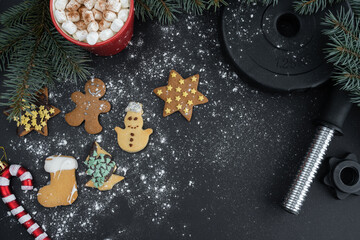 Gingerbread cookies, dumbbell barbell weight plate, hot chocolate or cocoa with marshmallows,...