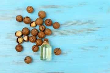 Macadamia Nut Oil and peeled macadamia nut. Healthy Skin and Hair and Natural Healing Oil...