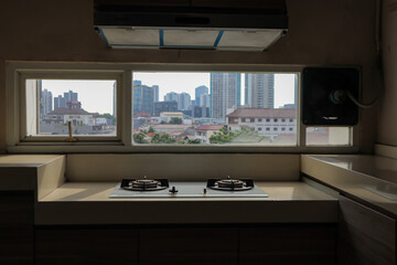 Hotel pantry with windows overlooking the city of Jakarta