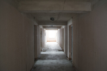 A long corridor in an abandoned building