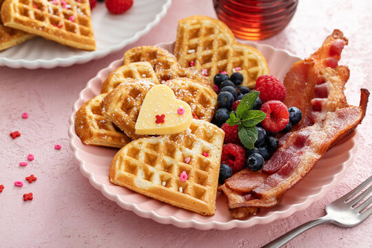 Valentine day breakfast with waffles heart shaped