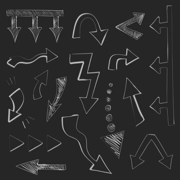 Collection of chalk hand drawn arrows different shape. Big and small doodle arrow marks, cursors for infographic, planning,  mind maps. Pointer sketch on black board