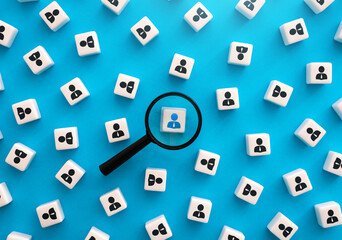 Magnifying glass and highlighted person. Select and recruit. HR search for new employees for the...