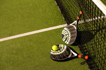 Paddle tennis objects and court. - Powered by Adobe