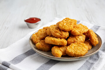 Homemade Chicken Nuggets with Ketchup, low angle view. Space for text.