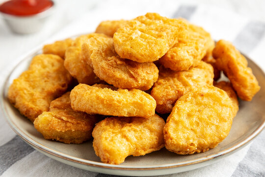 Homemade Chicken Nuggets with Ketchup, low angle view. Close-up.