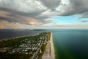 Aerial view of rich neighborhood with expensive vacation homes in Boca Grande, small town on Gasparilla Island in southwest Florida. American dream homes as example of real estate development in US