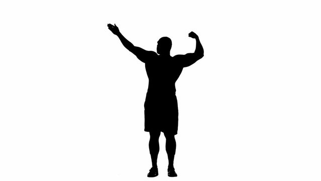 Black silhouette of a muscular man demonstrating muscle biceps in arnold pose on white isolated background. Bodybuilder poses in a stance, demonstrating strength and muscularity. Full length.