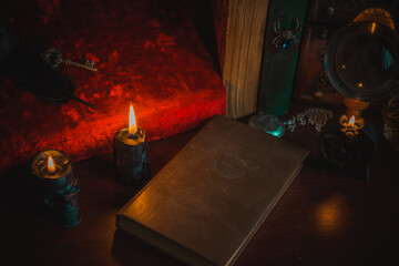 Concept removing bad negative energy, candles and other magical elements on a table, vintage...