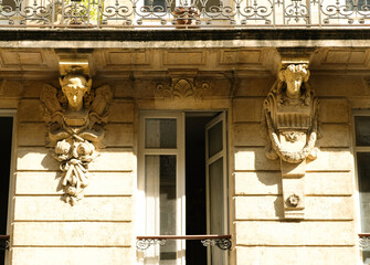 Bordeaux, France. Elaborated balcony decoration in the downtown.