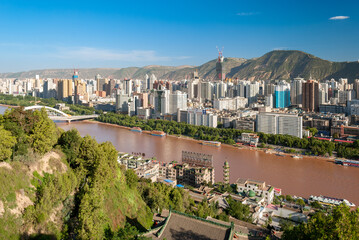 Panoramic view of the downtown of Lanzhou crossed by the Yellow river; Gansu province, China