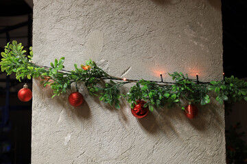 christmas wreath hanging on a wall