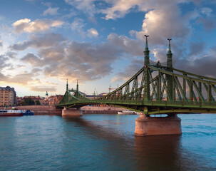 Budapest Liberty Bridge across the Danube river . Evening cityscape.