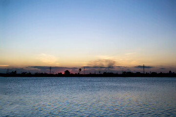 Sky and water Pollution of the environment at sunset Night horizon