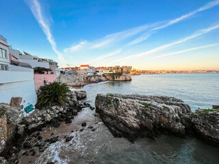 Fototapeta na wymiar Amazing sunset in a beach of the village of Cascais in Portugal,