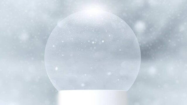 Christmas holiday empty snow globe snowball with falling snowflakes and bokeh glittering background. Copy space seamless loop background greeting card.