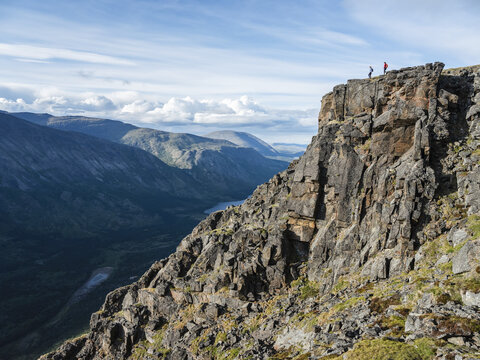 Two women exploring the mountains and wilderness of the Yukon. Feeling alive and vibrant in the beautiful scenery around Haines Junction; Yukon, Canada