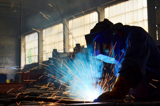 Welders Working