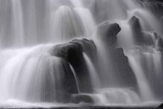 Close-up of flowing water at the bottom of a waterfall; Iceland