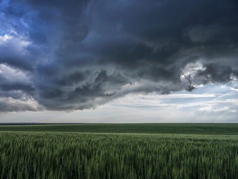 Dramatic skies over the landscape seen during a storm chasing tour in the midwest of the United States; Kansas, United States of America