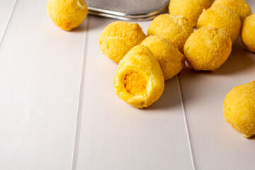 'salgadinho de festa' or brazilian traditional party snack. a mix made of coxinha, bolinha de queijo and risolis.