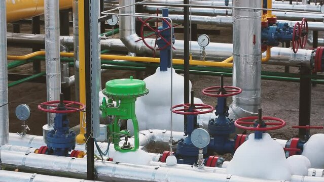 Gas distribution plant area and huge connecting pipes, manometers and valves