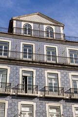 Fototapeta na wymiar Portuguese house covered with blue tiles azulejo