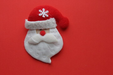 Santa Claus on a red background. Art Christmas greeting card