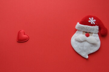 Santa Claus on a red background. Art Christmas greeting card