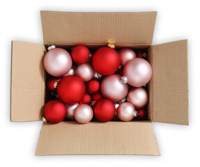 Christmas bright red baubles, open cardboard box full of pink christmas balls to decorate the christmas tree, top view isolated on transparent background, object for greetings gift card