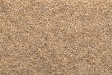 Hemp mat, surface and background, from above. Growth medium for growing microgreens. Industrial and natural hemp fibres, intertwined into a biodegradable and compostable alternative to growing soil.