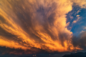 The incredible sunset seen from Valgioie (Valsangone, North-West of Italian Alps) on 7th August 2022. The clouds had unbelievable shapes and color tones. Valgioie, Piedmont, Italy