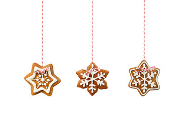 Hanging christmas gingerbread stars isolated on white background